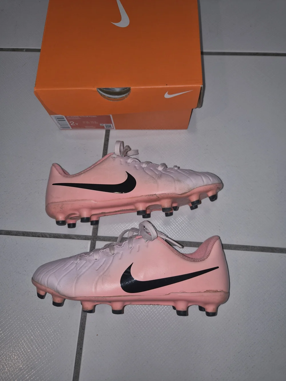 Nike Pink Soccer Cleats with Black Swoosh